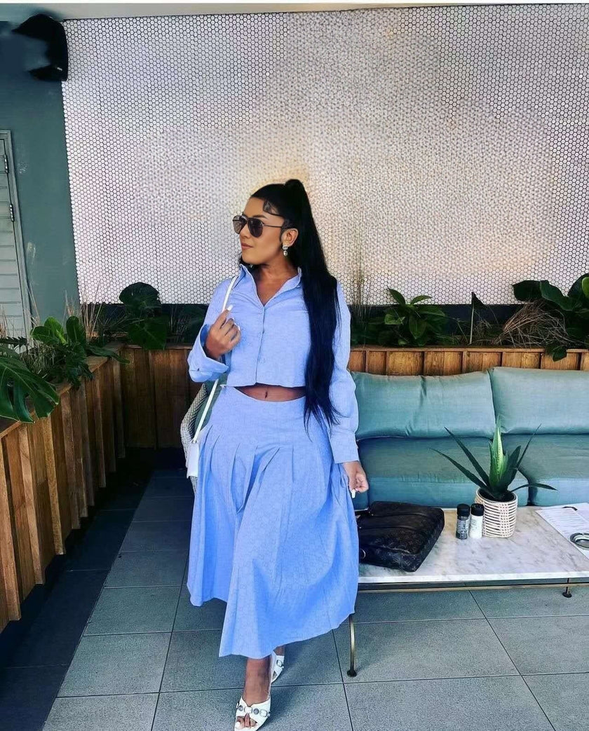 Two-piece Long Sleeve Crop Top and High Waist Maxi Skirt Set with Midriff and Loose Pleated Hem Design