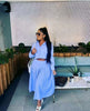 Two-piece Long Sleeve Crop Top and High Waist Maxi Skirt Set with Midriff and Loose Pleated Hem Design