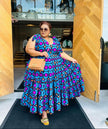 Plus size maxi dress with vivid geometric print, V-neck and tiered skirt
