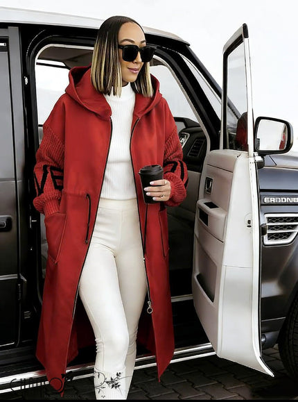 Red hooded knit coat with long sleeves and geometric cuff accents