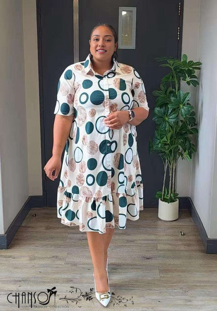 Plus size ruffle shirt dress, white with teal and brown circle pattern, button front