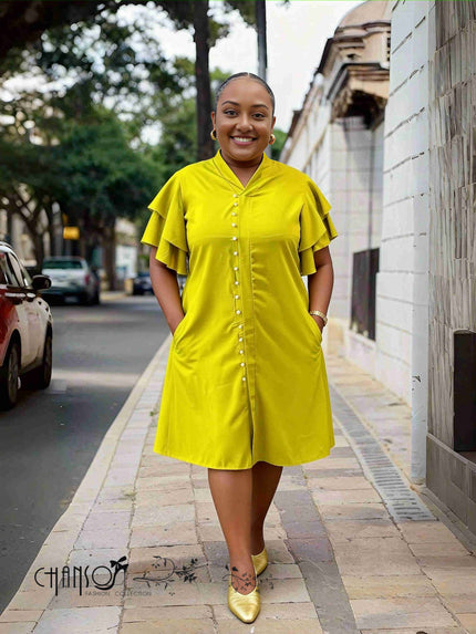 Plus size ruffle sleeve dress in yellow-green with center button front
