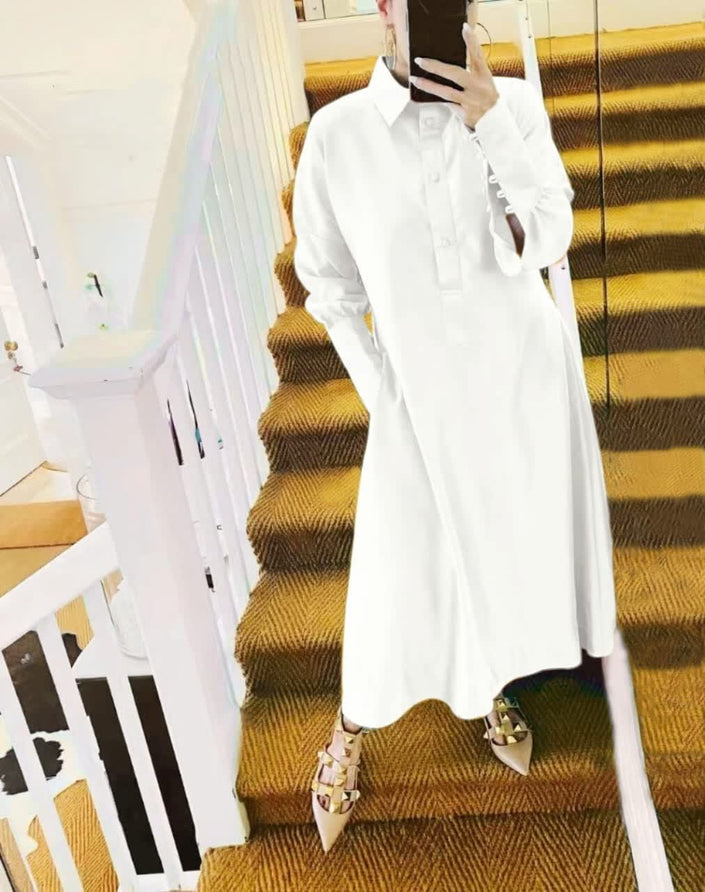 White collared midi shirt dress with long sleeves and button front