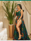 Sleeveless African print maxi dress with fitted bodice and flared skirt, green and orange