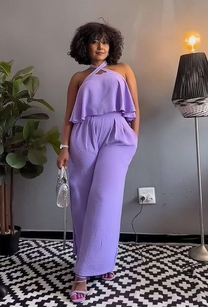 Lavender sleeveless cross-neck jumpsuit with layered ruffle bodice and wide legs