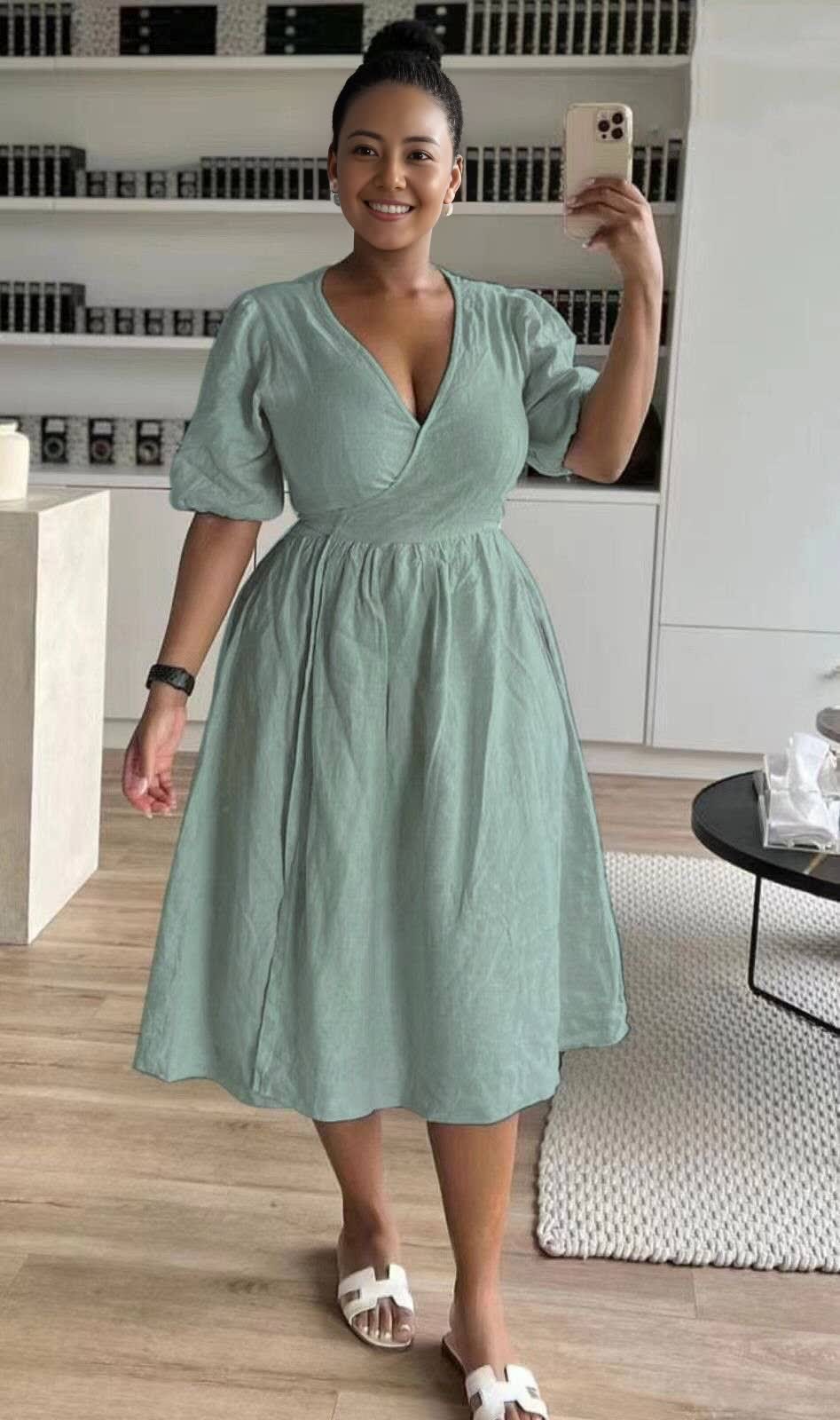 Turquoise wrap midi dress with puff sleeves and stretch waist