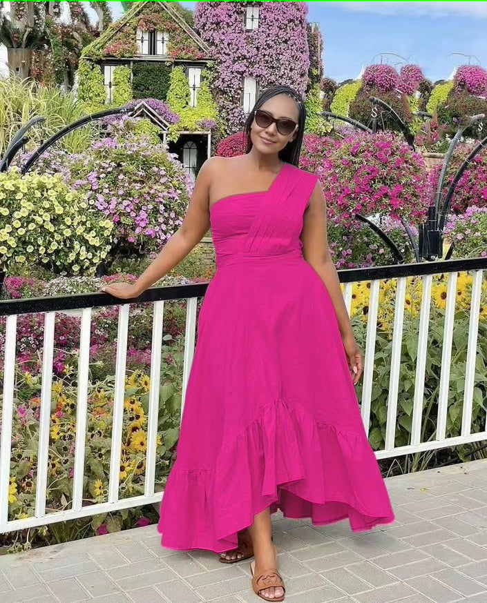 Deep-pink one-shoulder midi dress with ruffle hem and flared skirt