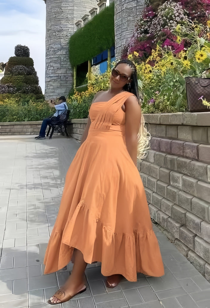 Orange one-shoulder midi dress with ruffle hem and flared skirt