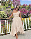 Beige one-shoulder midi dress with ruffle hem and gathered waist