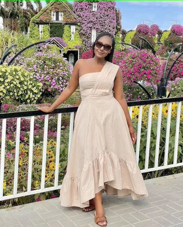 Beige one-shoulder midi dress with ruffle hem and gathered waist