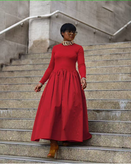 Red maxi dress with long sleeves, high neckline, and gathered A-line skirt