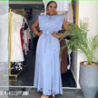 Sky-blue belted maxi shirt dress with button-down bodice and sleeveless yoke, long skirt