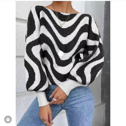 Striped knit sweater top with puff sleeves, loose fit, black and white zigzag