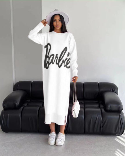 White knit maxi dress with long sleeves and script logo front, crew neckline.