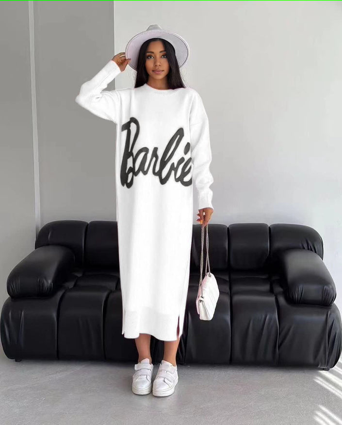 White knit maxi dress with long sleeves and script logo front, crew neckline.