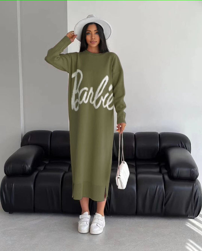 Olive knit maxi dress with long sleeves and white script logo front, crew neckline.