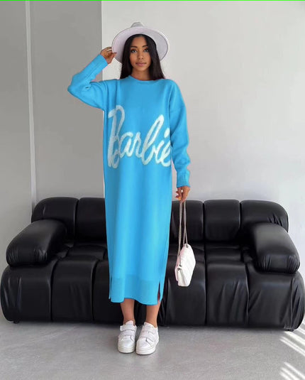 Turquoise knit maxi dress with long sleeves and white script logo front, crew neckline.