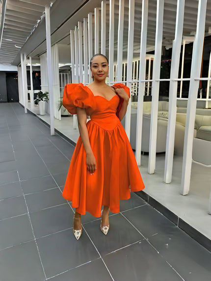 Puff sleeve midi dress in orange with square neckline and gathered waist