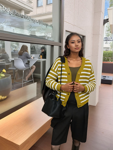 Striped knit cardigan with button front, yellow and white horizontal stripes