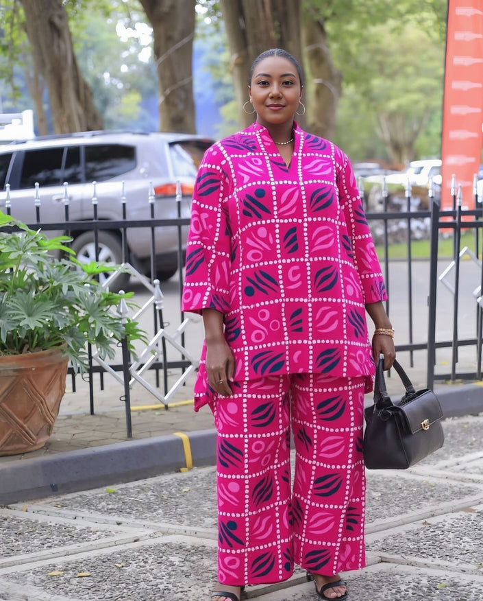 Bright pink geometric print twin set with wide-leg pants
