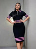 Knit top and skirt set with black fabric and purple striped trim, button-front top