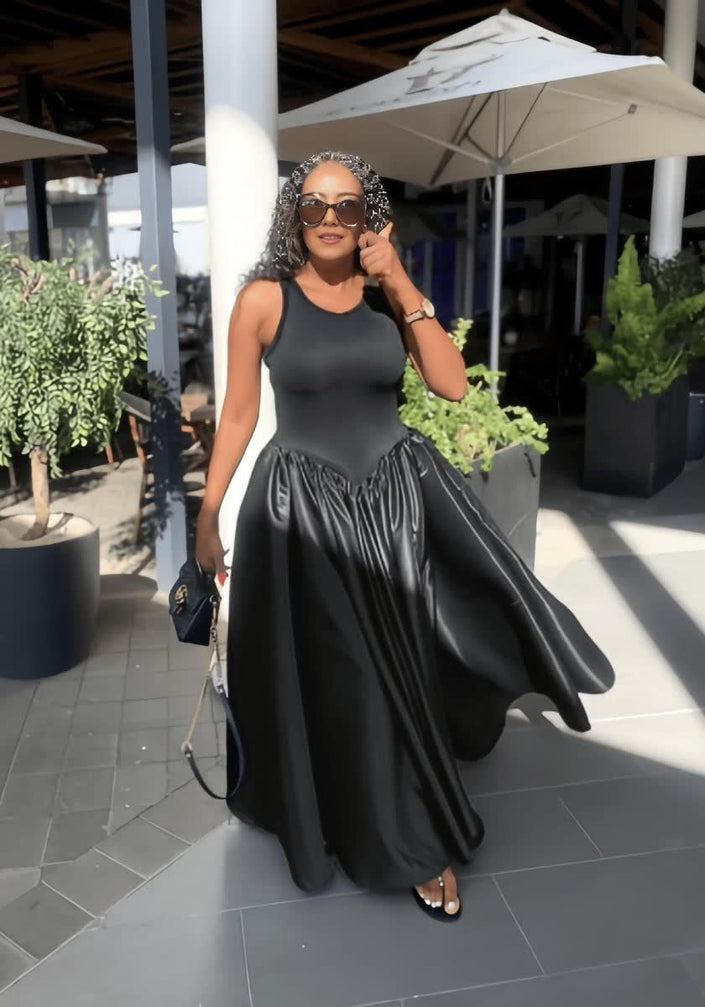 Black maxi dress with fitted sleeveless bodice and gathered full skirt