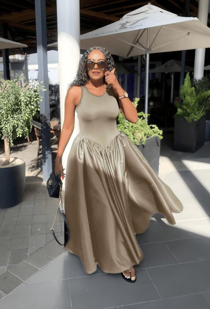 Khaki maxi dress with fitted sleeveless bodice and gathered full skirt