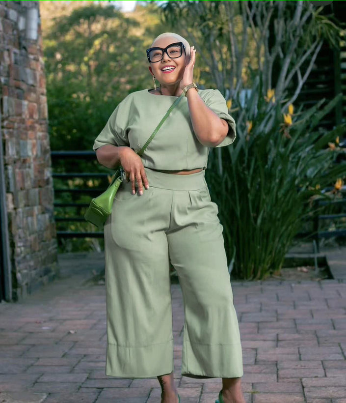 Light green twin set top and wide-leg pants with short sleeves and contrast green belt