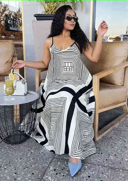 Geometric maxi dress with adjustable spaghetti straps, black-and-white striped print