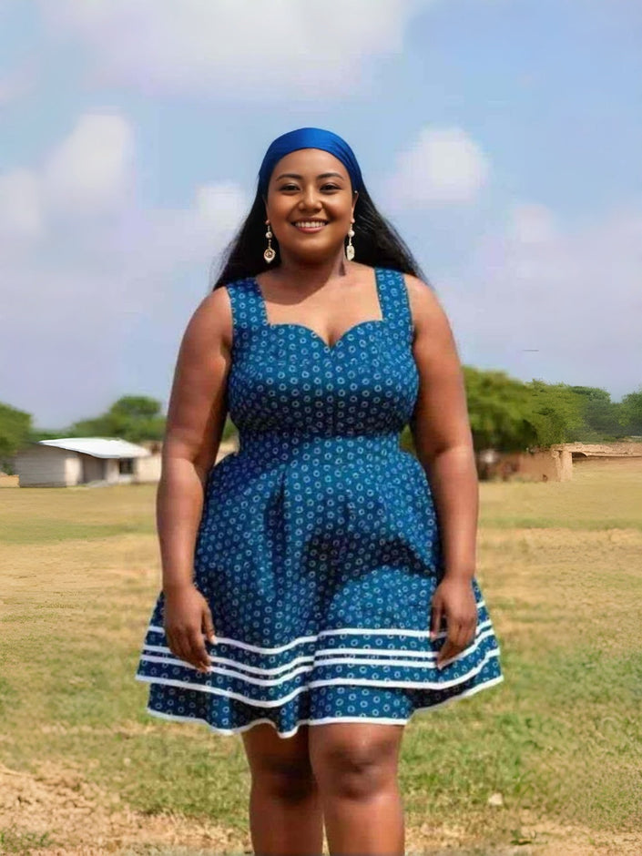 Blue sleeveless A-line mini dress with square neckline and ethnic print