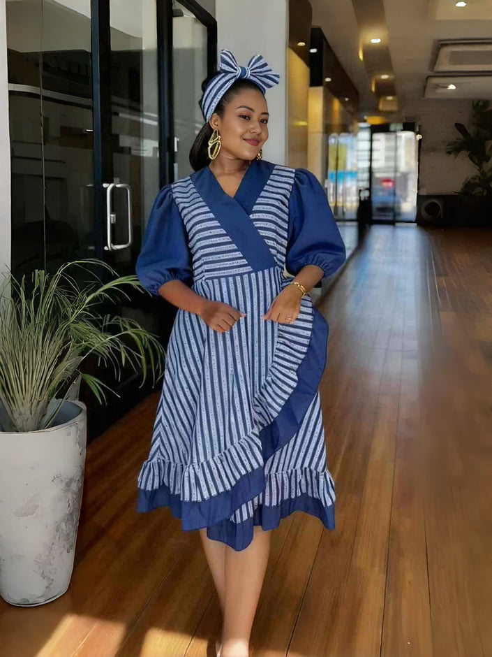 Blue striped wrap dress with puff sleeves and ruffled hem