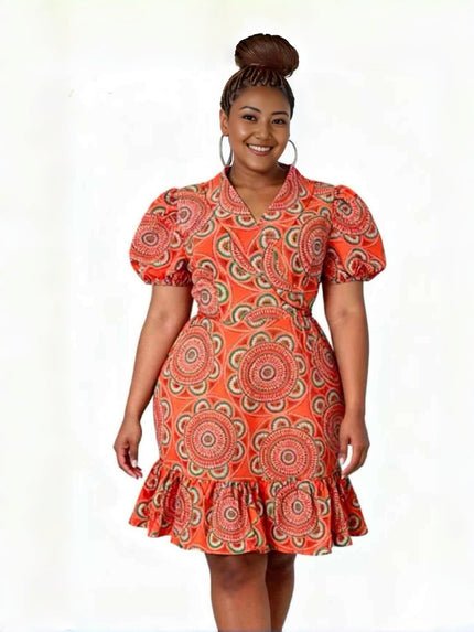 Orange wrap dress with puff sleeves, circular African print, and ruffle hem