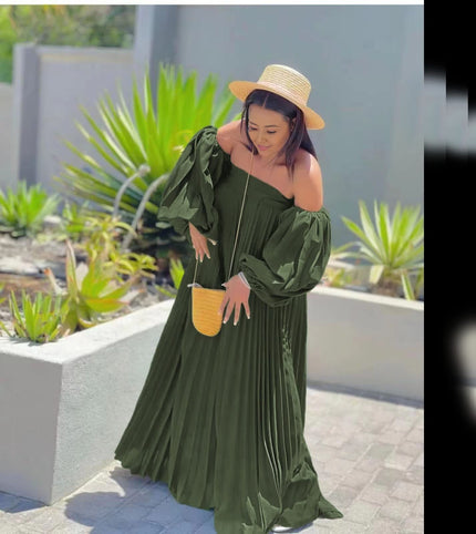 Off-shoulder pleated maxi dress, dark green puff sleeves.