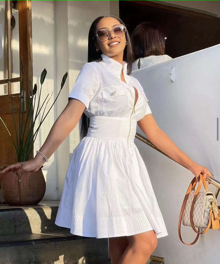White A-line mini dress with high collar, short sleeves, front zip, flared skirt