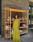 Lime green halter maxi dress with tassel fringe hem and draped front