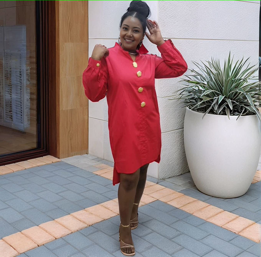 Red midi dress with long sleeves, five-button front, and round neckline.