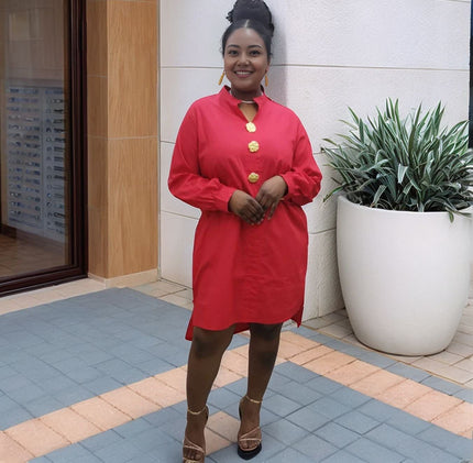 Red midi dress with long sleeves, five-button front, and round neckline.
