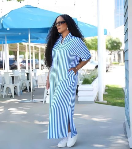 Collared striped midi dress with front slit, light sky-blue vertical stripes.