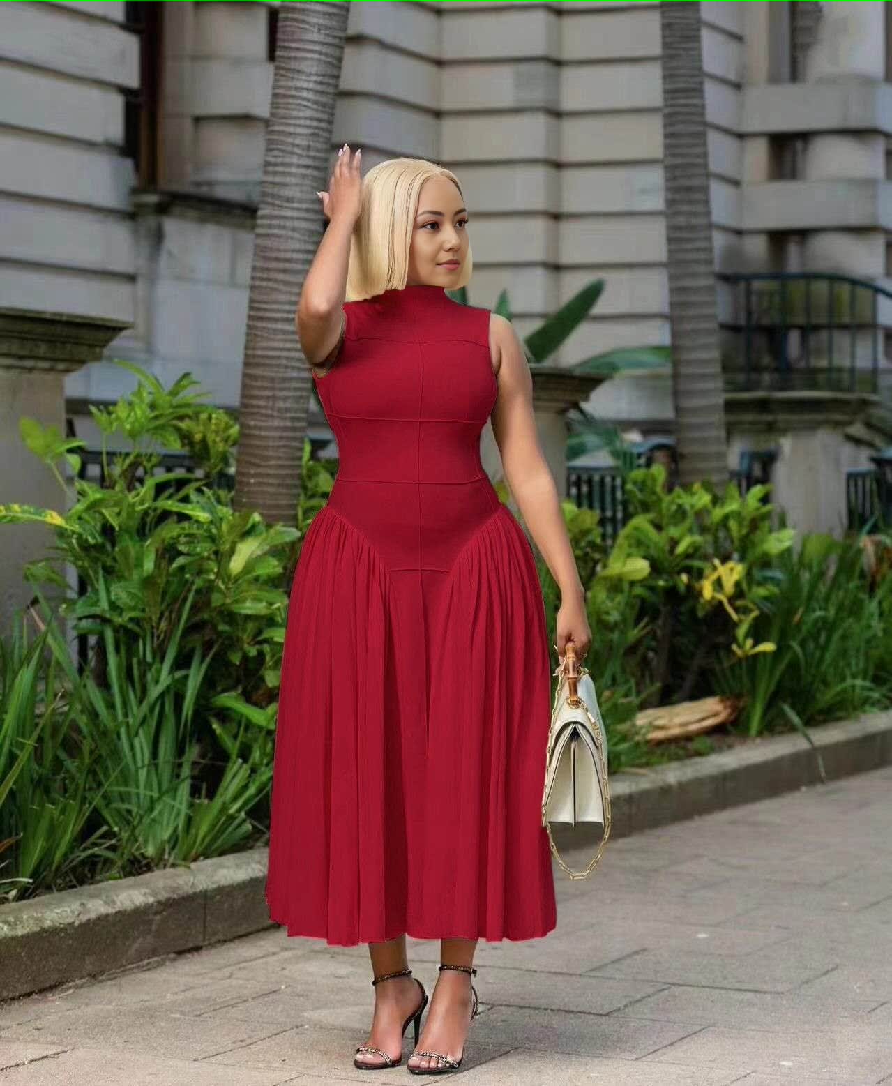 Deep red pleated midi A-line dress, sleeveless high neckline, flared gathered skirt