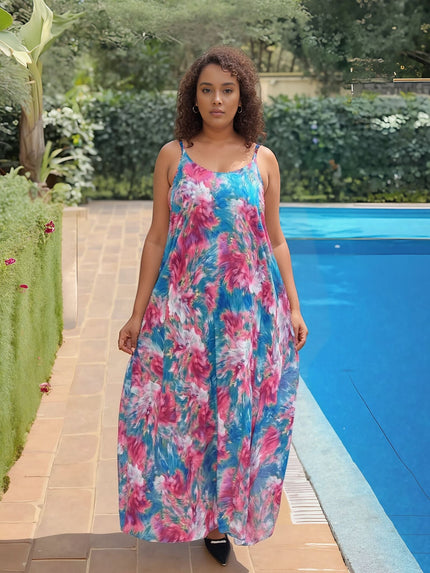 Vibrant printed maxi dress with pink and blue floral pattern, sleeveless scoop neck