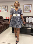 Zebra print puff sleeve dress with V-neck and white button belt at waist