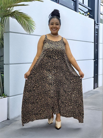 Leopard print maxi dress with adjustable hem, black with beige spots, spaghetti straps