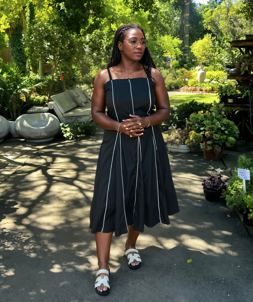 '- Sleeveless A-Line Dress with Vertical Piping