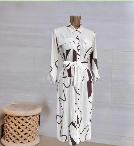 Midi shirt dress with button front, long sleeves, collar, abstract black/white print, waist tie