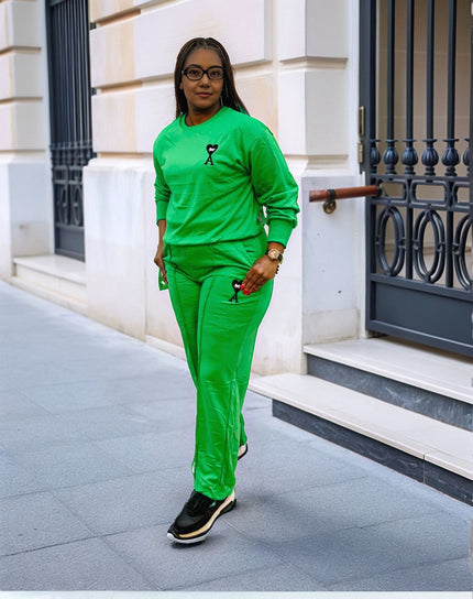 Emerald-green two-piece jogger set with crewneck sweatshirt and matching joggers