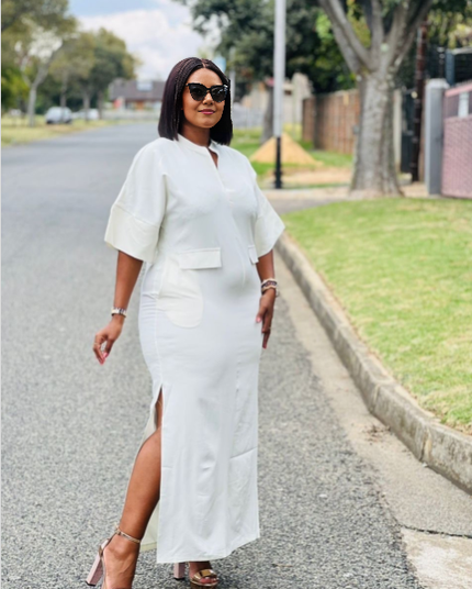 White short-sleeve midi dress with V-neck, patch pockets, and front slit