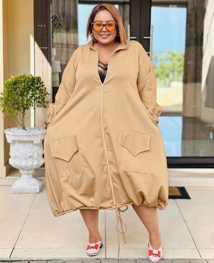 Beige midi dress with zip front, puff sleeves, patch pockets, adjustable drawstring hem
