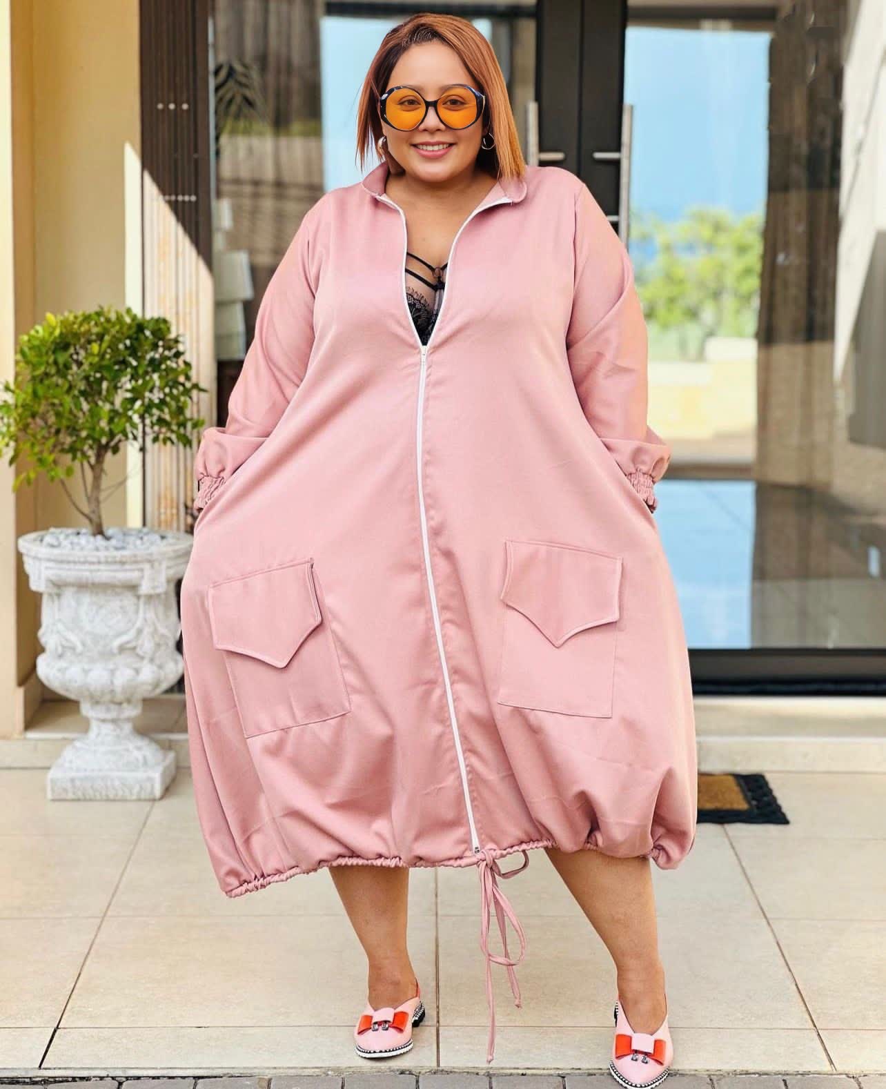 Pink midi dress with zip front, puff sleeves, patch pockets, adjustable drawstring hem