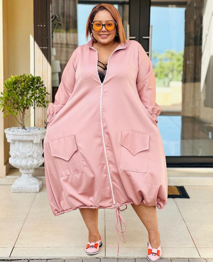Pink midi dress with zip front, puff sleeves, patch pockets, adjustable drawstring hem
