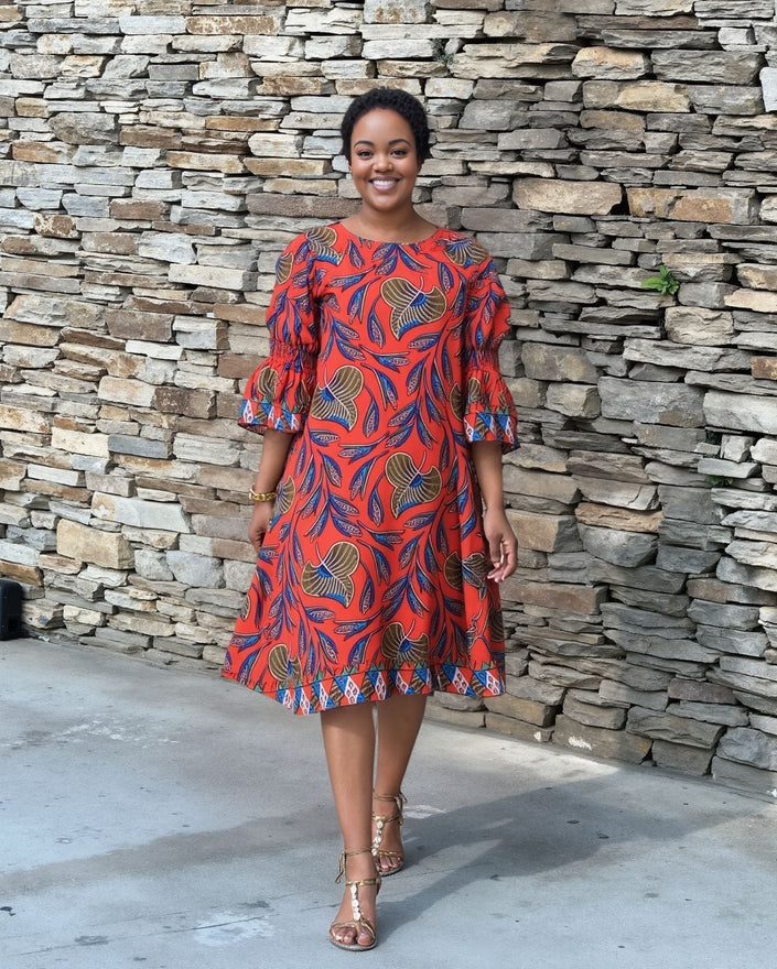 Red leaf-print midi dress with puff sleeves and tiered hem